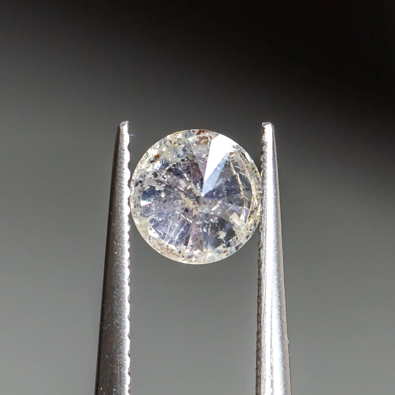 1.16CT ROUND BRILLIANT SALT AND PEPPER DIAMOND, GLITTERY BRILLIANT WITH SPECKLE INCLUSIONS, 6.40X4.27MM