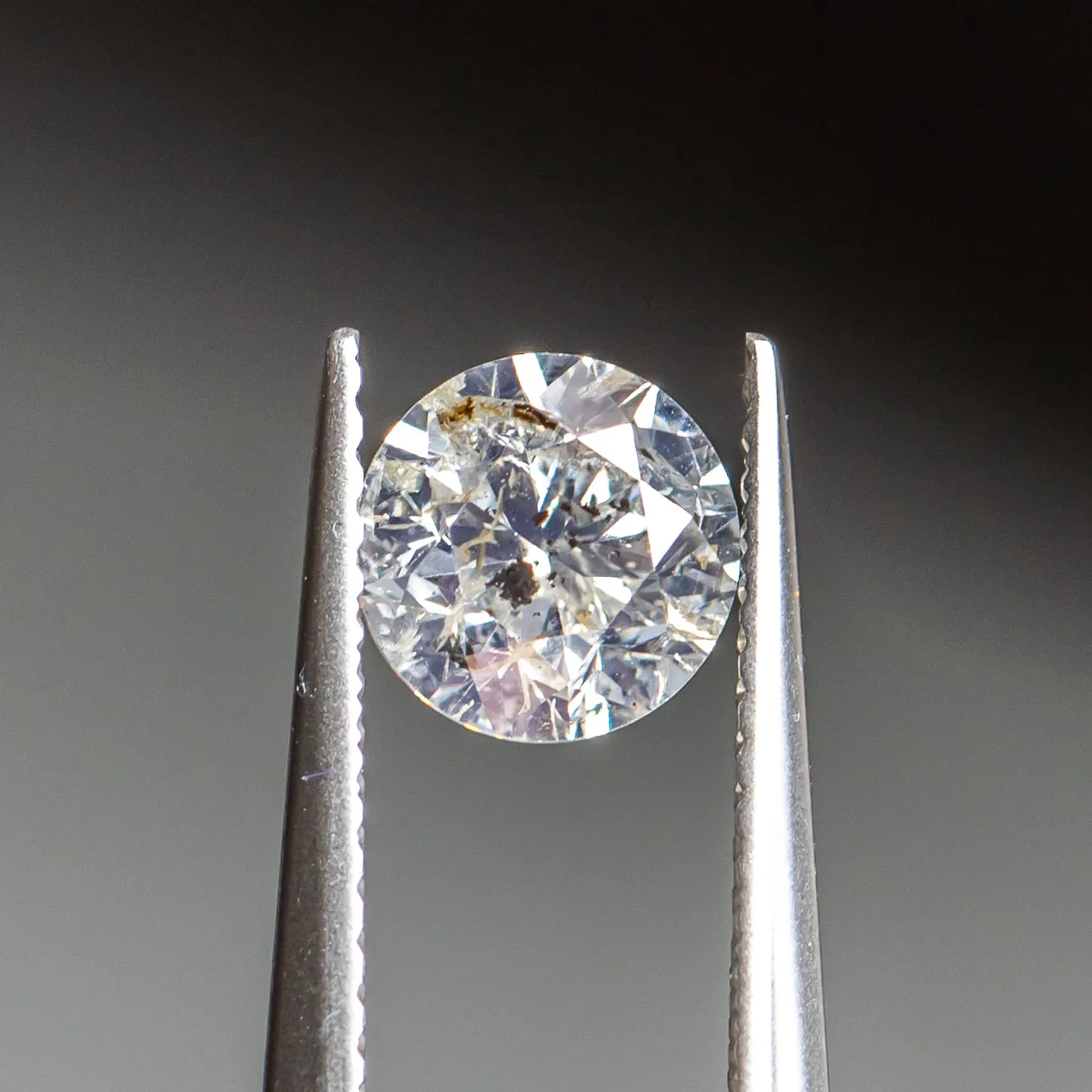 1.16CT ROUND BRILLIANT SALT AND PEPPER DIAMOND, GLITTERY BRILLIANT WITH SPECKLE INCLUSIONS, 6.40X4.27MM