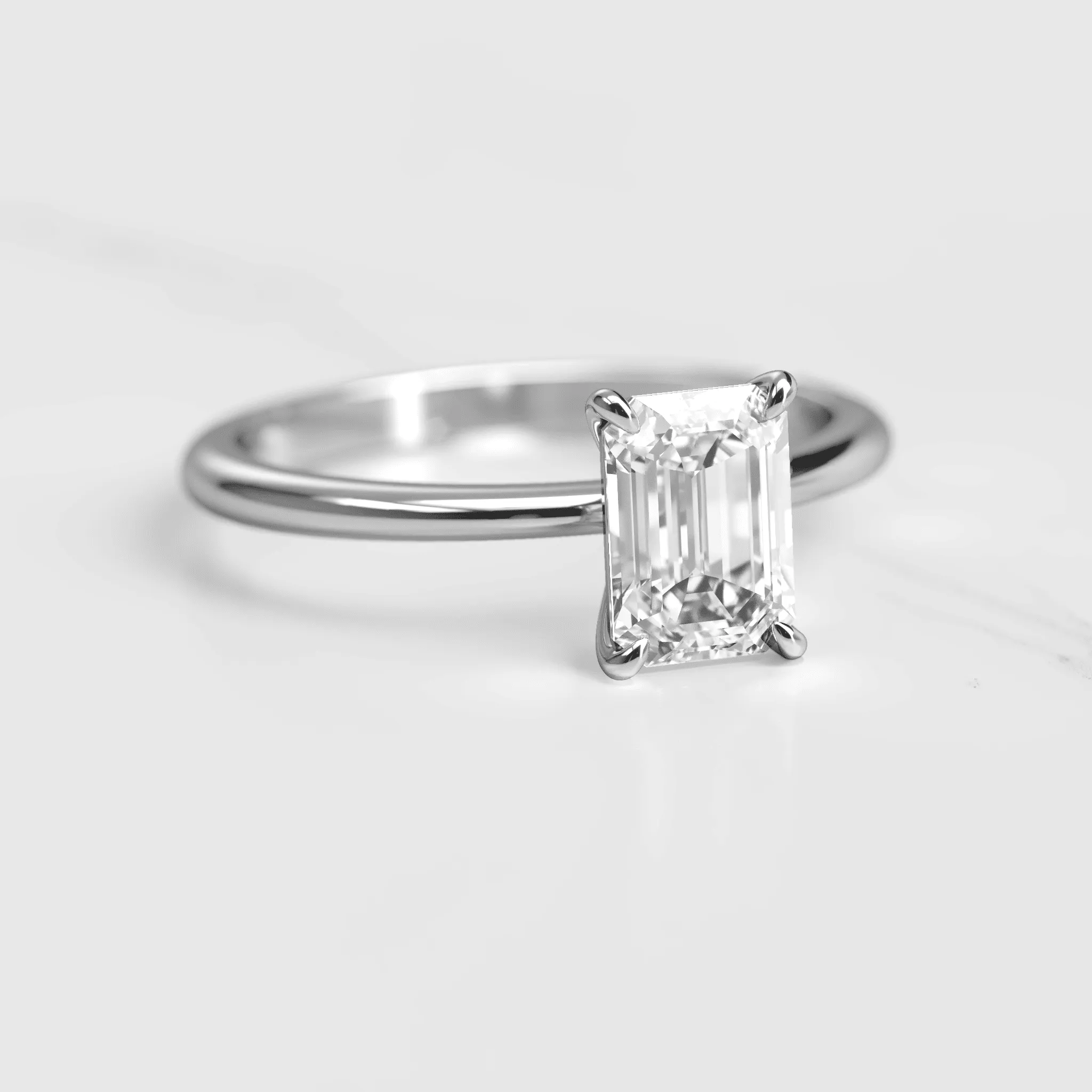 Emerald Tapered Solitaire Diamond Ring