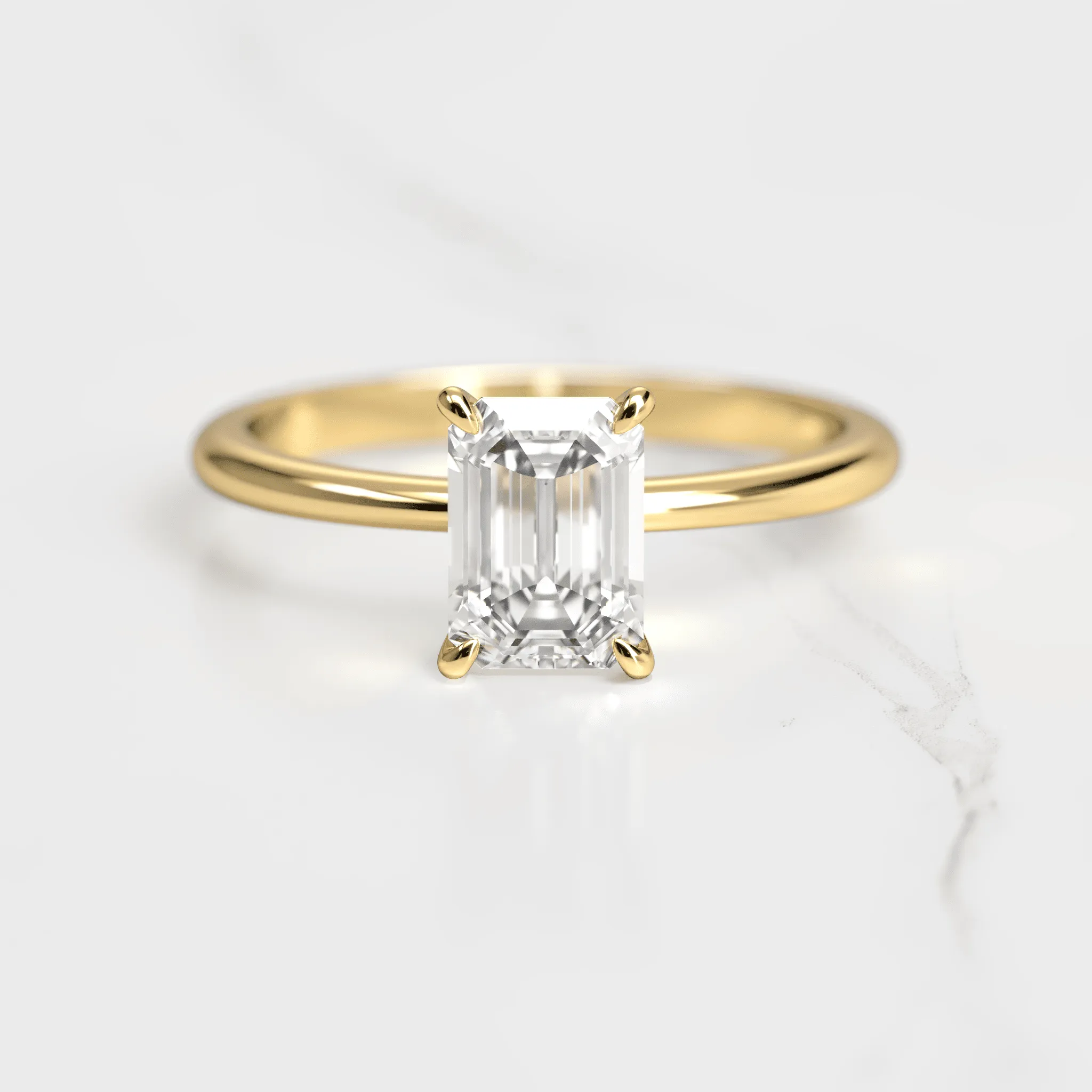 Emerald Tapered Solitaire Diamond Ring