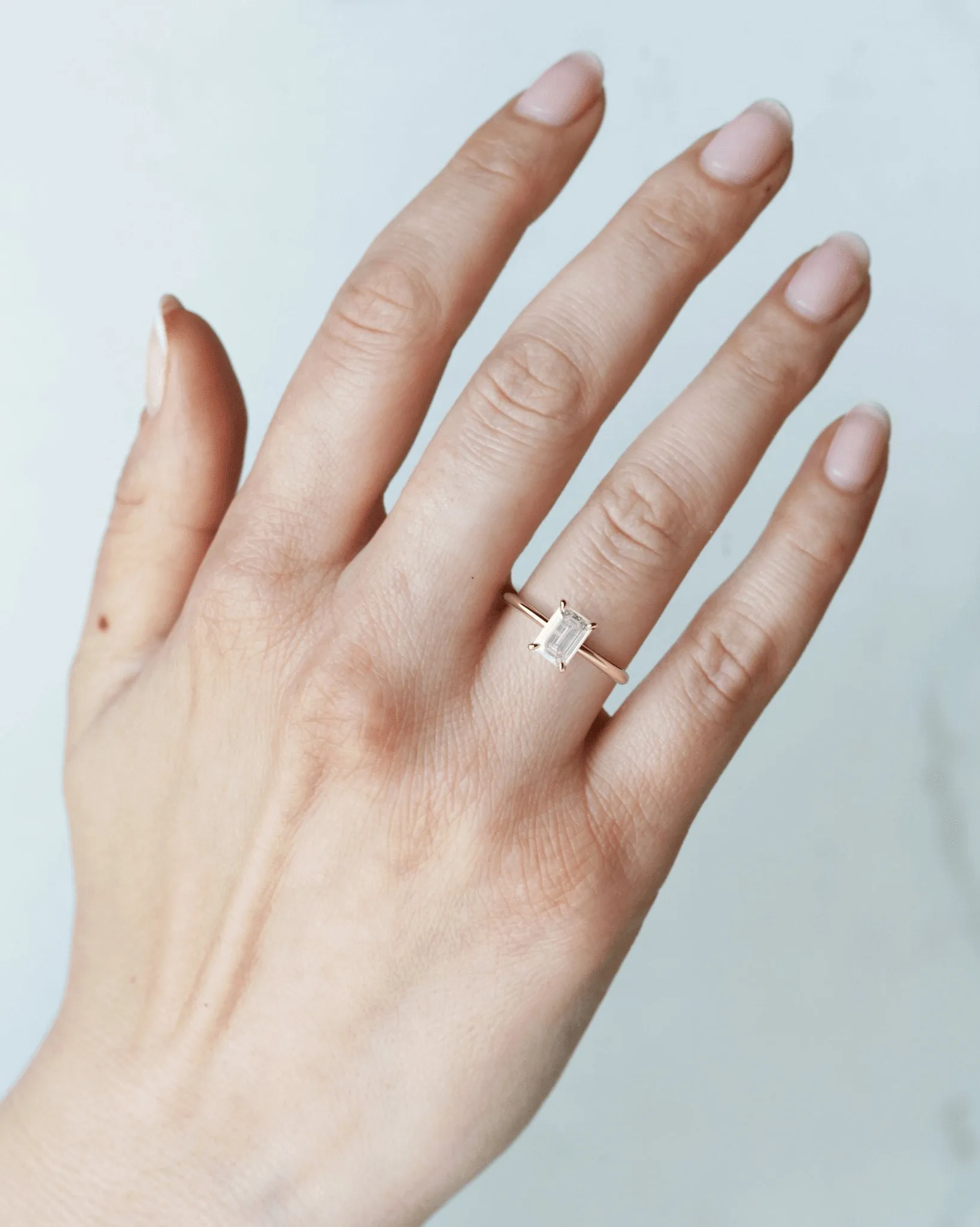 Emerald Tapered Solitaire Diamond Ring